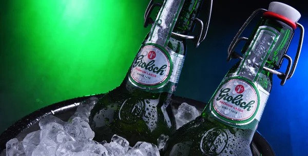 Bottles of Grolsch beer in bucket with crushed ice — Stock Photo, Image