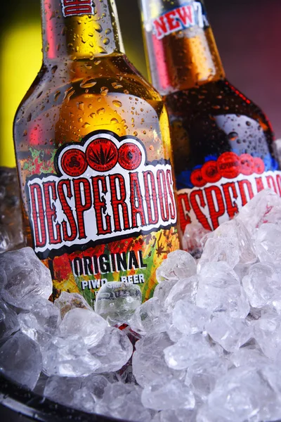 Bottles of Desperados beer in bucket with crushed ice — ストック写真