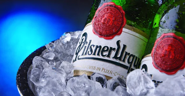 Bottles of Pilsner Urquell beer in bucket with crushed ice — Stock Photo, Image