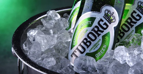 Bottles of Tuborg Beer in bucket with crushed ice — Stock Photo, Image