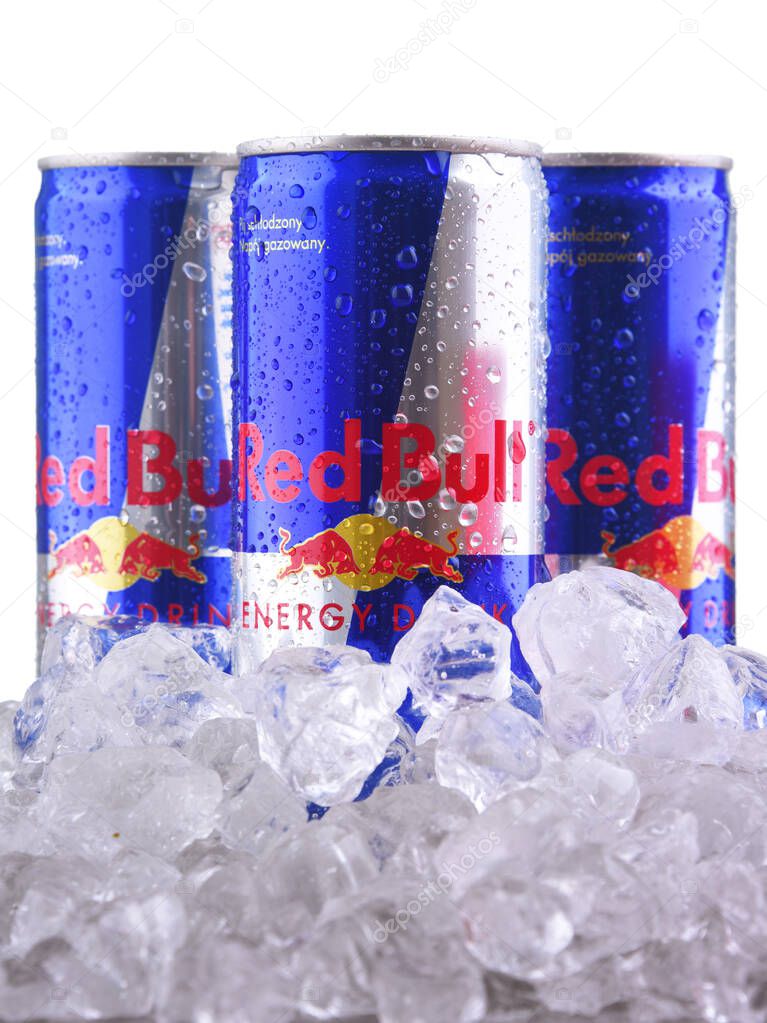 POZNAN, POL - OCT 23, 2019: Cans of Red Bull, an energy drink sold by Red Bull GmbH, an Austrian company created in 1987