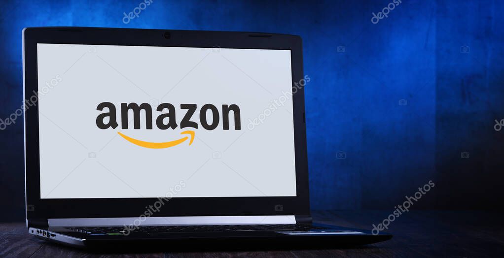 POZNAN, POL - MAR 24, 2019: Laptop computer displaying logo of Amazon, an American multinational technology company that focuses in e-commerce, cloud computing, and artificial intelligence