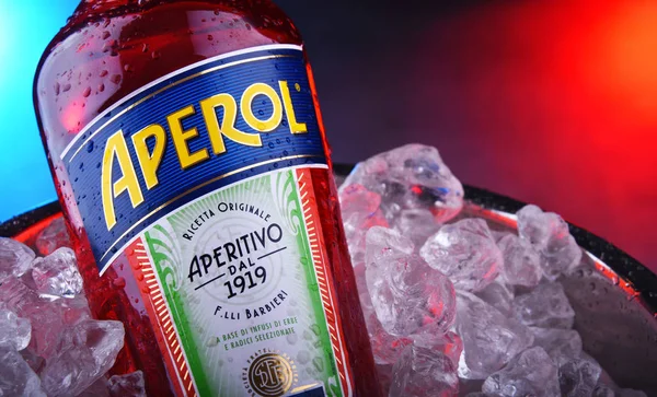 Bottle of Aperol in bucket with crushed ice — Stock Photo, Image