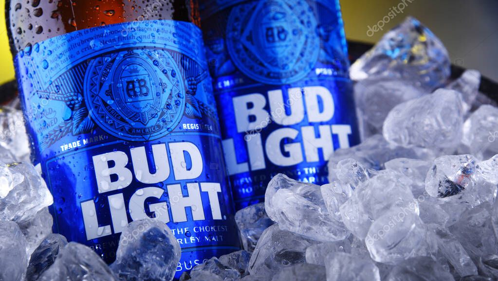 POZNAN, POL - NOV 22, 2019: Bottles of Bud Light beer, an American light beer, produced by Anheuser-Busch, introduced in 1982.