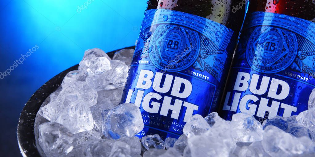 POZNAN, POL - NOV 22, 2019: Bottles of Bud Light beer, an American light beer, produced by Anheuser-Busch, introduced in 1982.