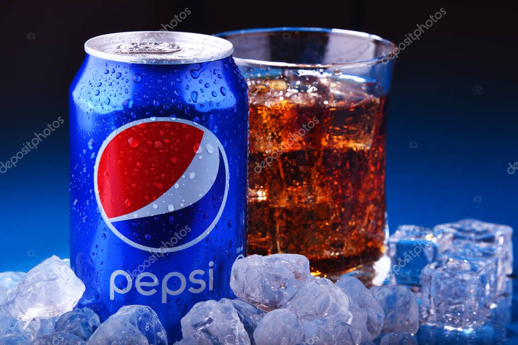 POZNAN, POL - NOV 22, 2019: Can and glass of Pepsi, a carbonated soft drink produced and manufactured by PepsiCo. The beverage was created and developed in 1893 under the name Brad's Drink