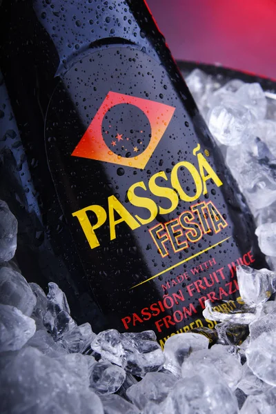 Bottle of Passoa, a passion-fruit liqueur in bucket with ice — Stock Photo, Image