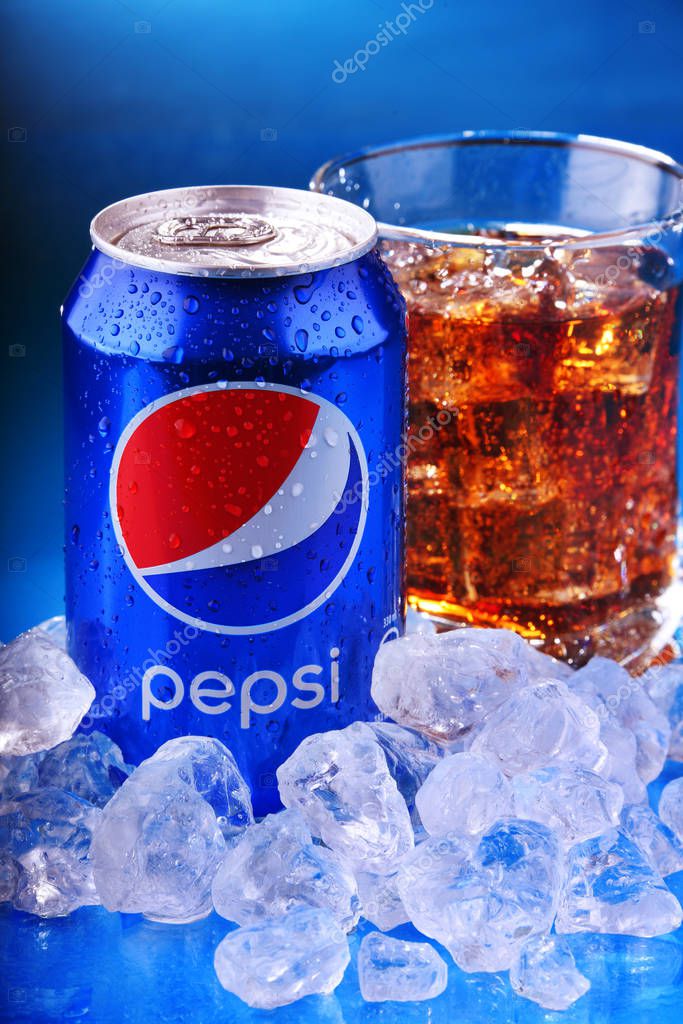POZNAN, POL - NOV 22, 2019: Can and glass of Pepsi, a carbonated soft drink produced and manufactured by PepsiCo. The beverage was created and developed in 1893 under the name Brad's Drink