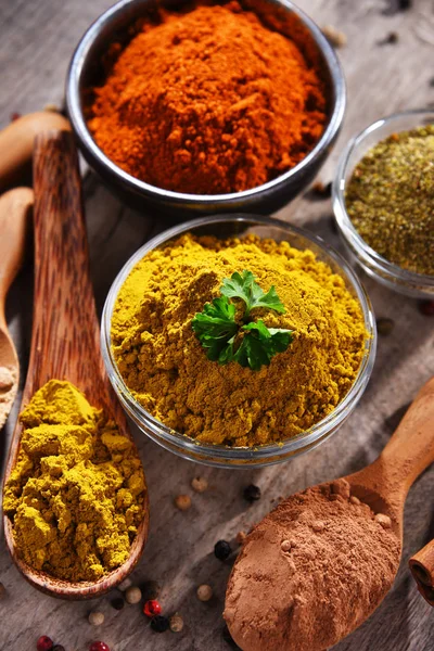 Variety of spices on kitchen table — Stock Photo, Image