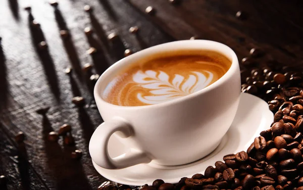 LONDON, UK - AUGUST 15, 2019: Pack of Nescafe Gold Cappuccino with coffee  beans and sugar cubes on light background Stock Photo - Alamy