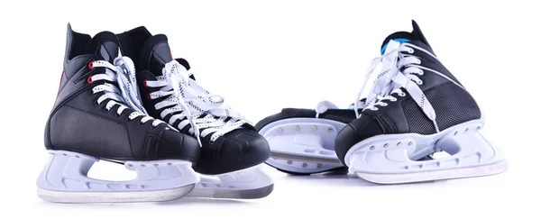 Two pairs of ice hockey skates isolated on white — 스톡 사진