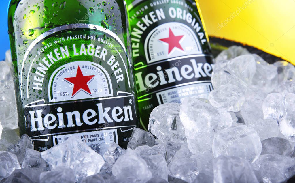 POZNAN, POL - NOV 22, 2019: Bottles of Heineken Lager Beer, the flagship product of Heineken International which owns over 125 breweries in more than 70 countries