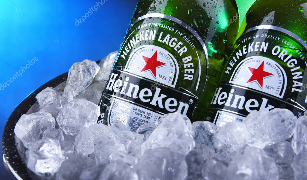 POZNAN, POL - NOV 22, 2019: Bottles of Heineken Lager Beer, the flagship product of Heineken International which owns over 125 breweries in more than 70 countries