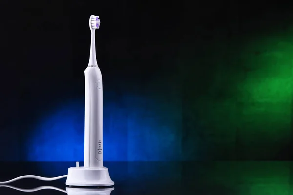 Modern rechargeable electric sonic toothbrush — Stock Photo, Image