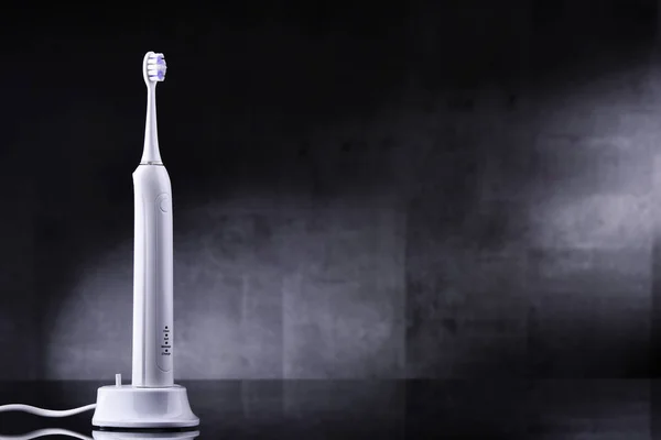 Modern rechargeable electric sonic toothbrush — Stock Photo, Image