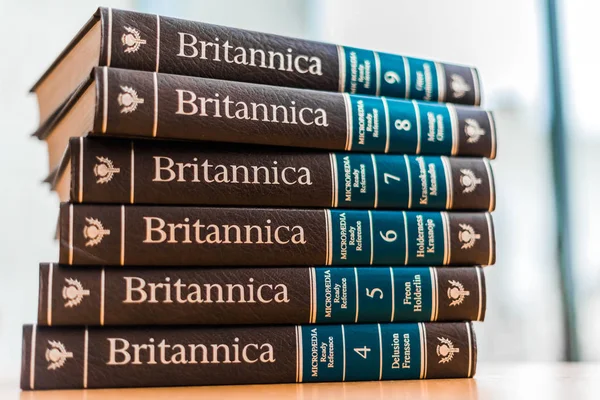 Encyclopedia Britannica volume in a public library — стокове фото