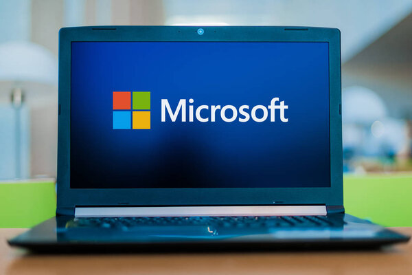 Laptop computer displaying logo of Microsoft
