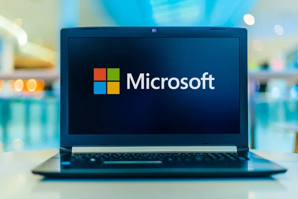 Laptop computer displaying logo of Microsoft — Stock Photo, Image