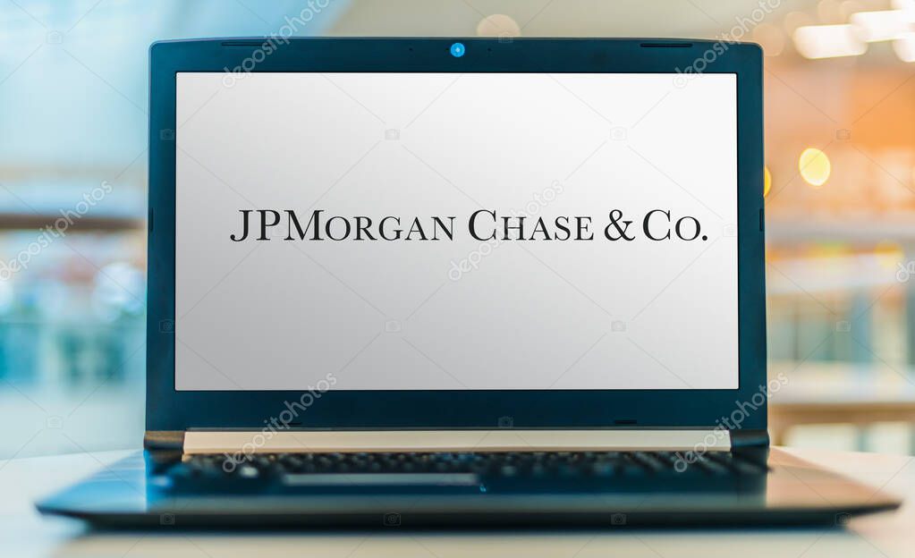 POZNAN, POL - JAN 30, 2020:  Laptop computer displaying logo of JPMorgan Chase & Co., an American multinational investment bank and financial services holding company headquartered in New York City