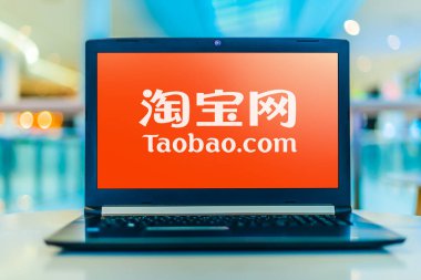 Taobao 'nun logosunu gösteren dizüstü bilgisayar