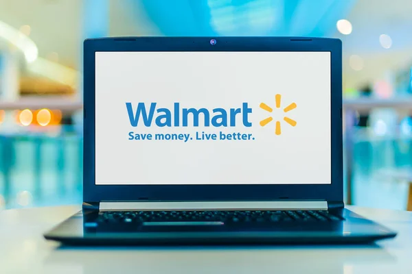 Laptop számítógép a Walmart logójának megjelenítésével — Stock Fotó