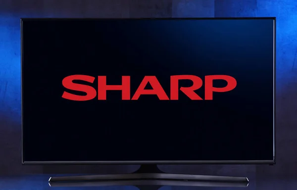 TV s plochou obrazovkou zobrazující logo Sharp — Stock fotografie