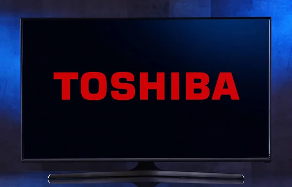 Flat-screen TV set displaying logo of Toshiba — Stock Photo, Image