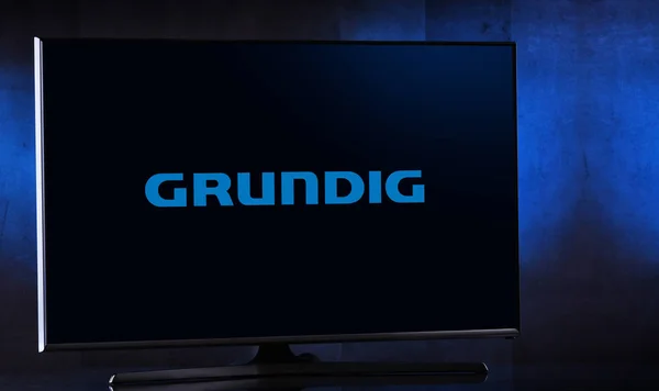 グランドディグのロゴが表示されるフラットスクリーンテレビセット — ストック写真