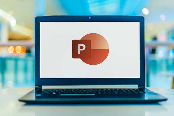 POZNAN, POL - FEB 18, 2020: Laptop computer displaying logo of Microsoft PowerPoint, a presentation program, part of the Office family software and services developed by Microsoft