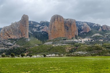 Mallos De Riglos are the picturesque rocks in Huesca Spain clipart