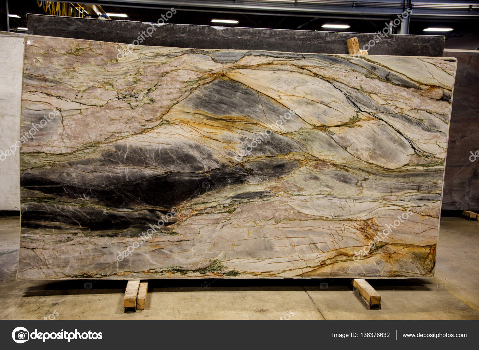 Colorful granite and marble slabs preparation for fabrication of kitchen countertops Stock Photo
