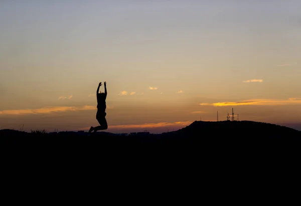 Silhouette of person against a beautiful sunset .travel photos — Stock Photo, Image