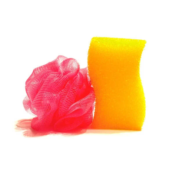 Gele en rode spons op een witte achtergrond, isoleren — Stockfoto