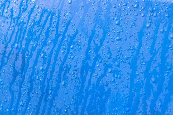 Tło Niebieskiej Tekstury Powierzchni Samochodu Gdzie Spadają Krople Deszczu Śniegu — Zdjęcie stockowe