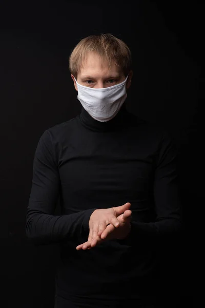 Man Medical Mask Shows How Treat His Hands Antiseptic Coronavirus — Stock Photo, Image