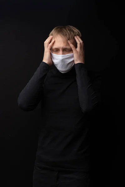 Masked Man Holds His Head Pain Symptoms Coronavirus — Stock Photo, Image