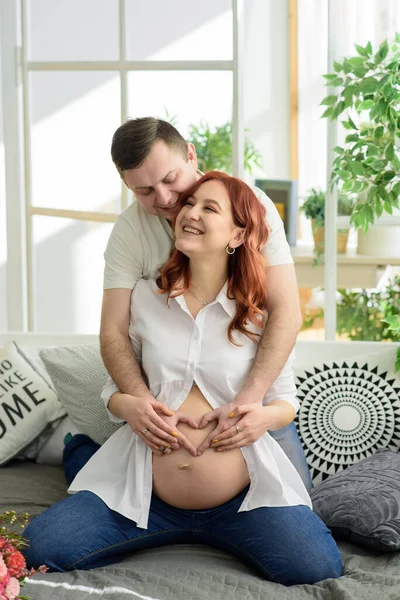 Future Father Shows Fingers Heart Belly His Pregnant Wife — Stock Photo, Image