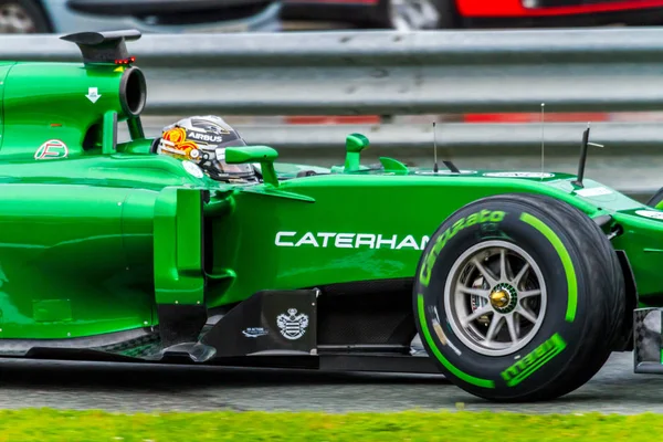 Команда Caterham F1, Kamui Kobayashi, 2014 — стоковое фото