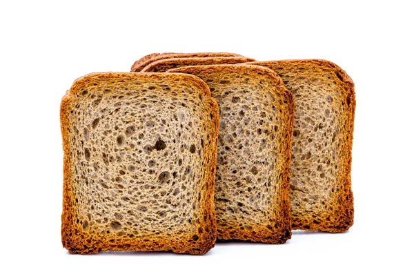 Toastscheiben auf Weiß — Stockfoto