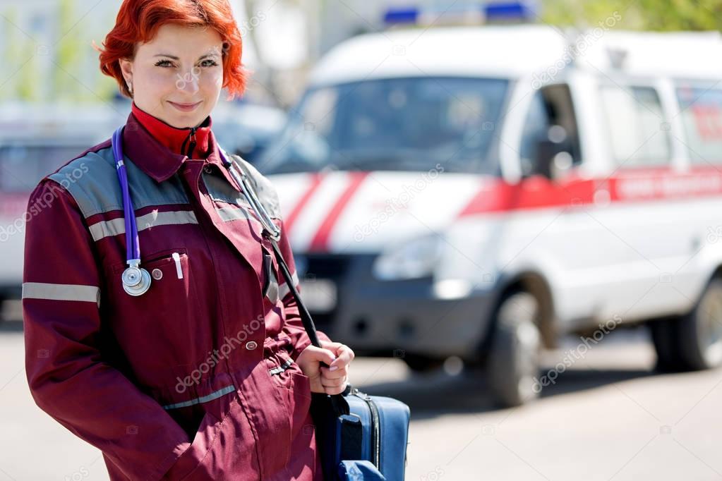 Paramedic with ambulance bag