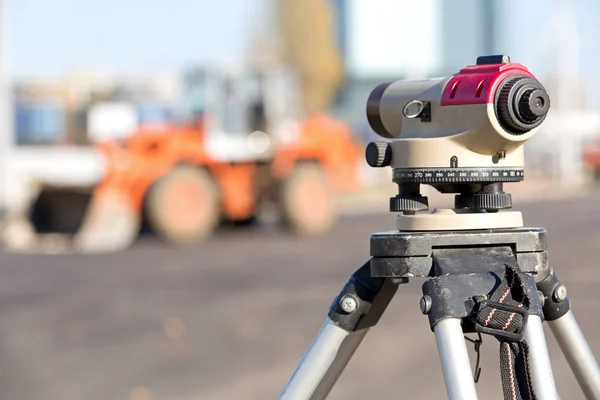 Land surveying equipment theodolite at construction site — Stock Photo, Image