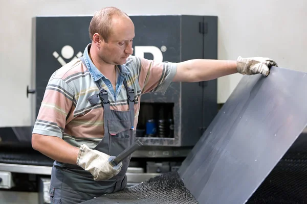 Factory Man Worker Holding Steel Sheet