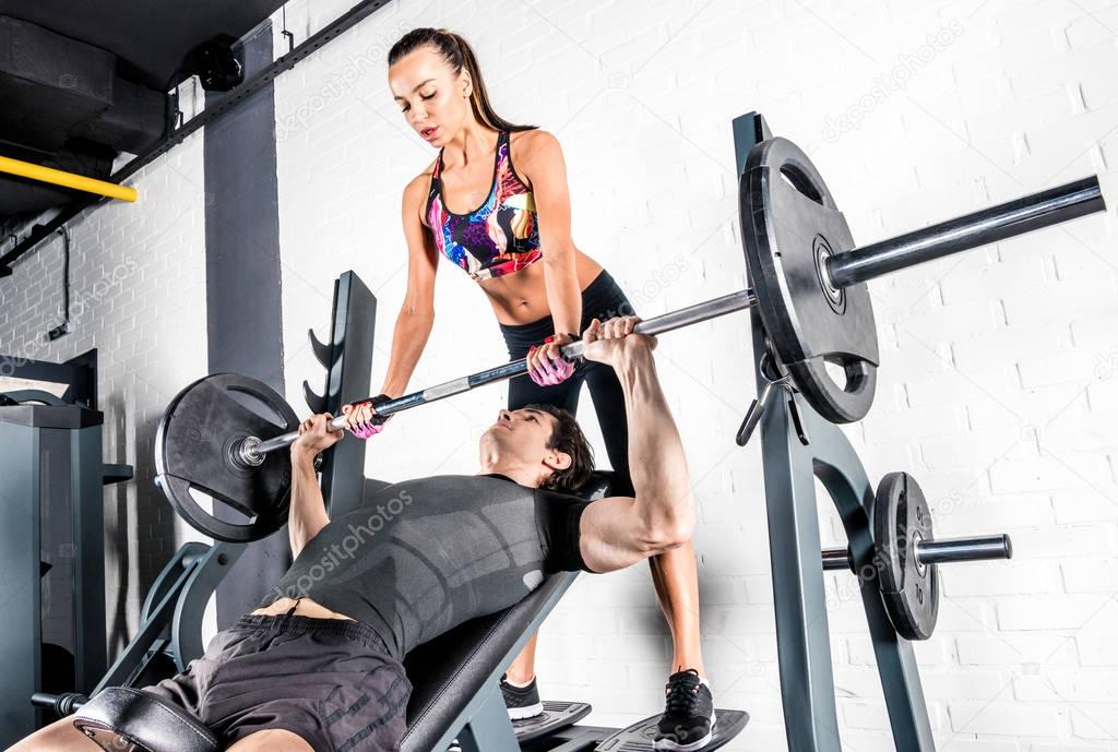 Sportspeople training in gym