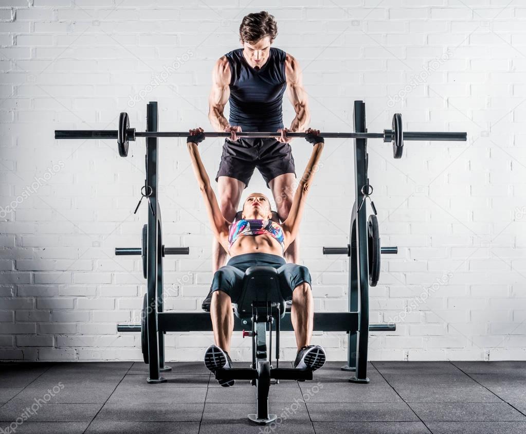 Sportspeople training in gym