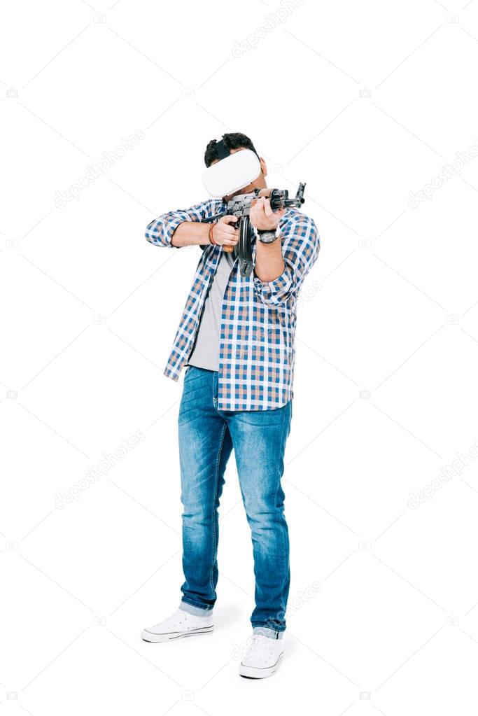 man in virtual reality headset with rifle