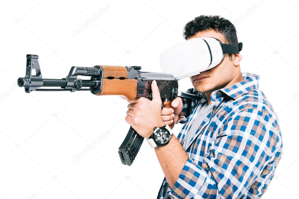 man in virtual reality headset with rifle