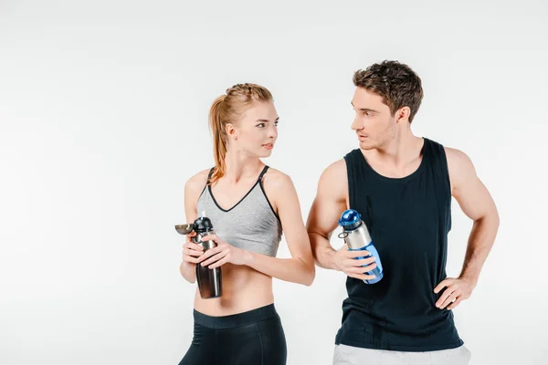 Couple with fitness shakers — Stock Photo, Image