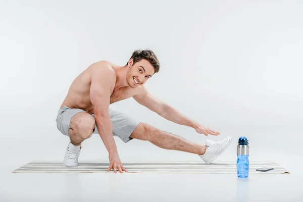 Young man stretching — Stock Photo, Image