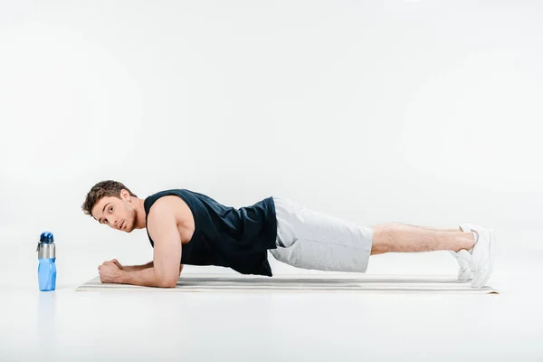 Young man standing plank — Stock Image Young man standing plank Stock Image
