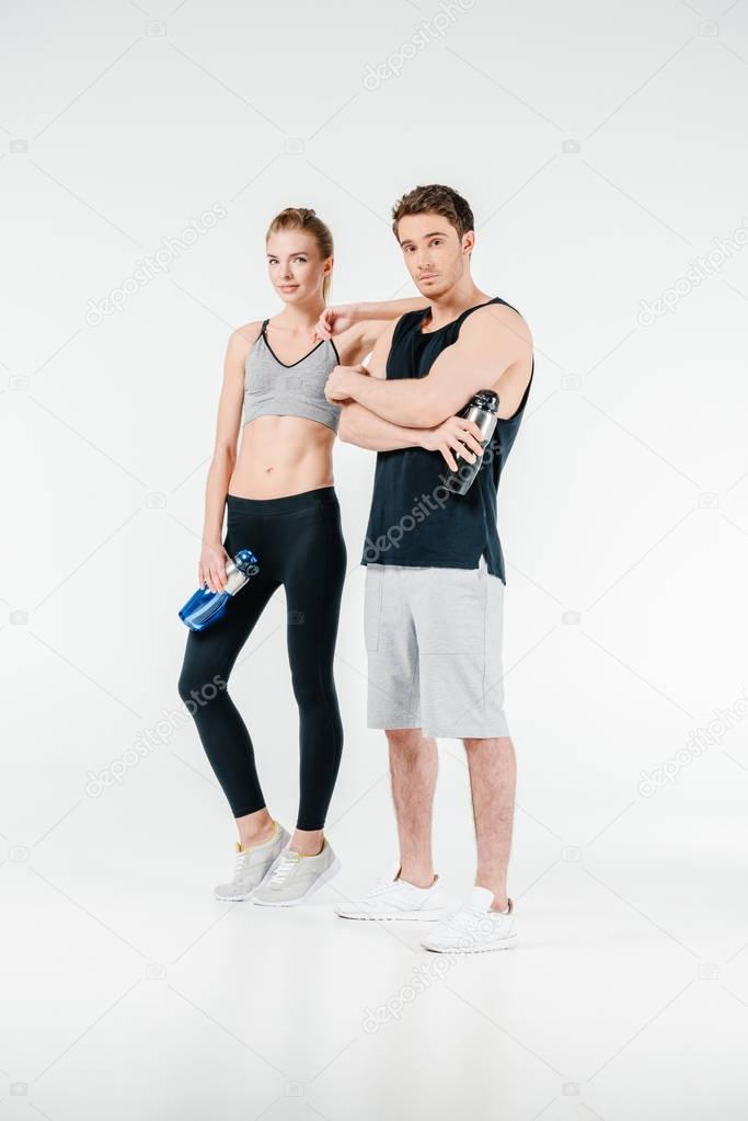 couple with fitness shakers